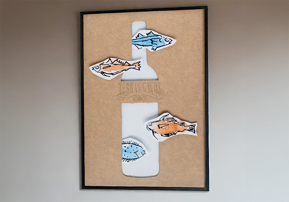 a poster with fish drawn in ink and a laser cut bottle for the wine make Terras Gauda