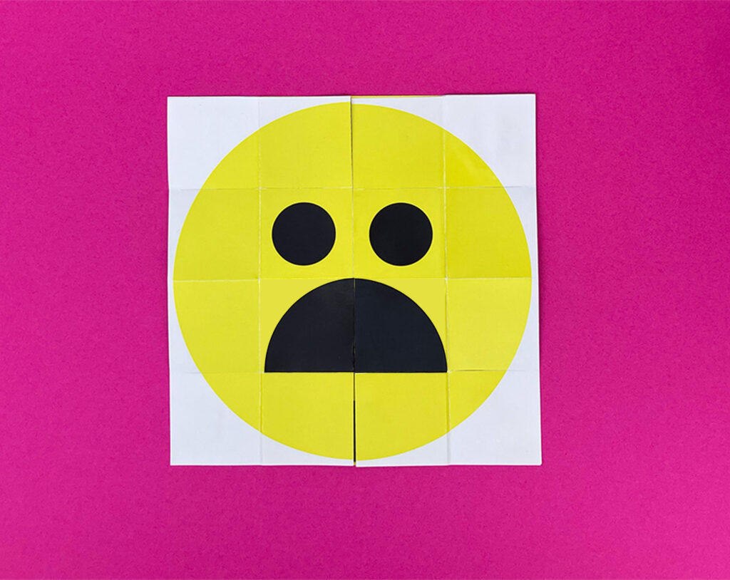 a photo presenting an unhappy smiley 