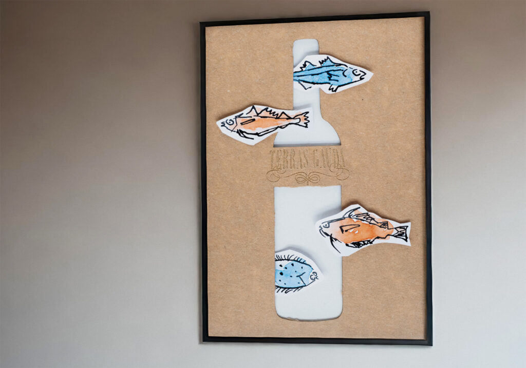 a poster with fish drawn in ink and a laser cut bottle for the wine make Terras Gauda