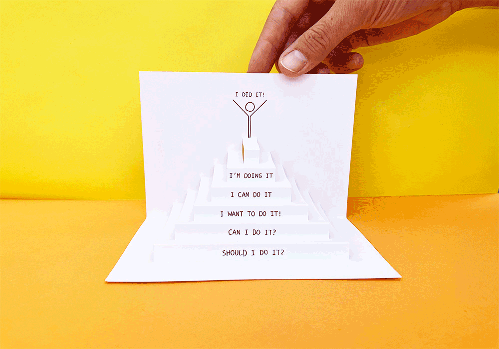 animated photos of a card which opens and closes itself. Inside, are 3D steps, with on each steps a motivational speech to get on the top of the stairs 